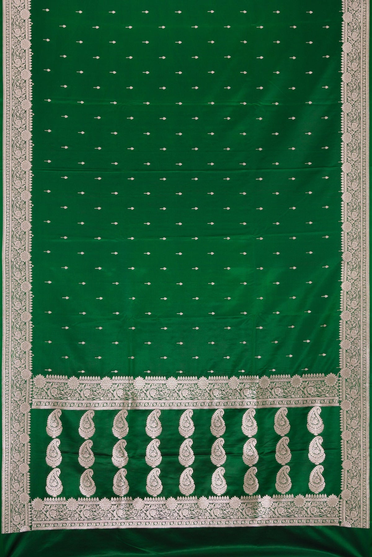 Flat view of Bottle Green Dual Tone Banarasi Silk Saree with Zari Butta on the body and Zari Border. 