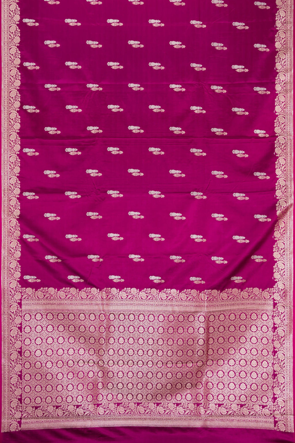 Flat view of Burgundy Dual Tone Banarasi Silk Saree with Zari Butta on the body and Zari Border. 