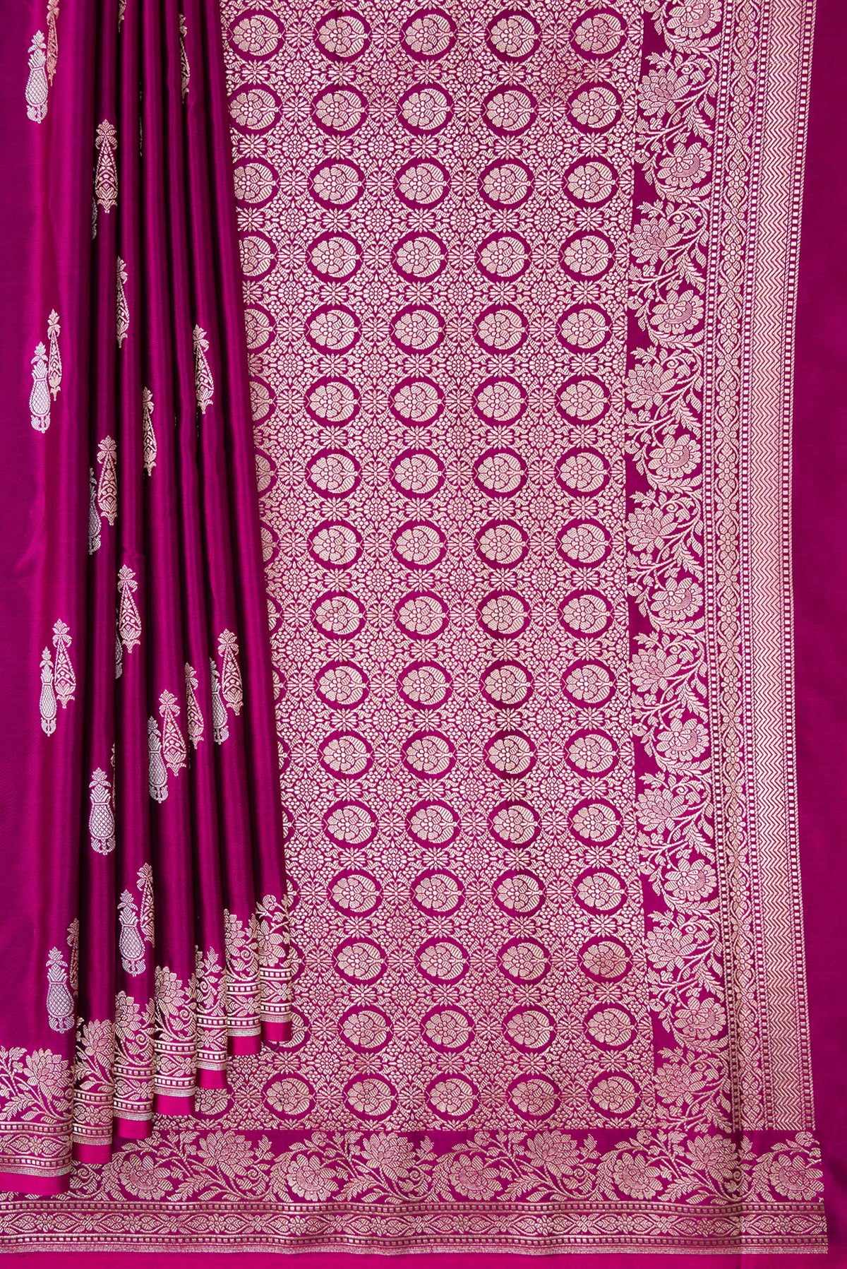 Pleats and pallu of Burgundy Dual Tone Banarasi Silk Saree with Zari Butta on the body and Zari Border. 