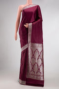 Burgundy Dual Tone Blended Banarasi Silk Saree with Plain Body and Fancy Border.  displayed on a mannequin