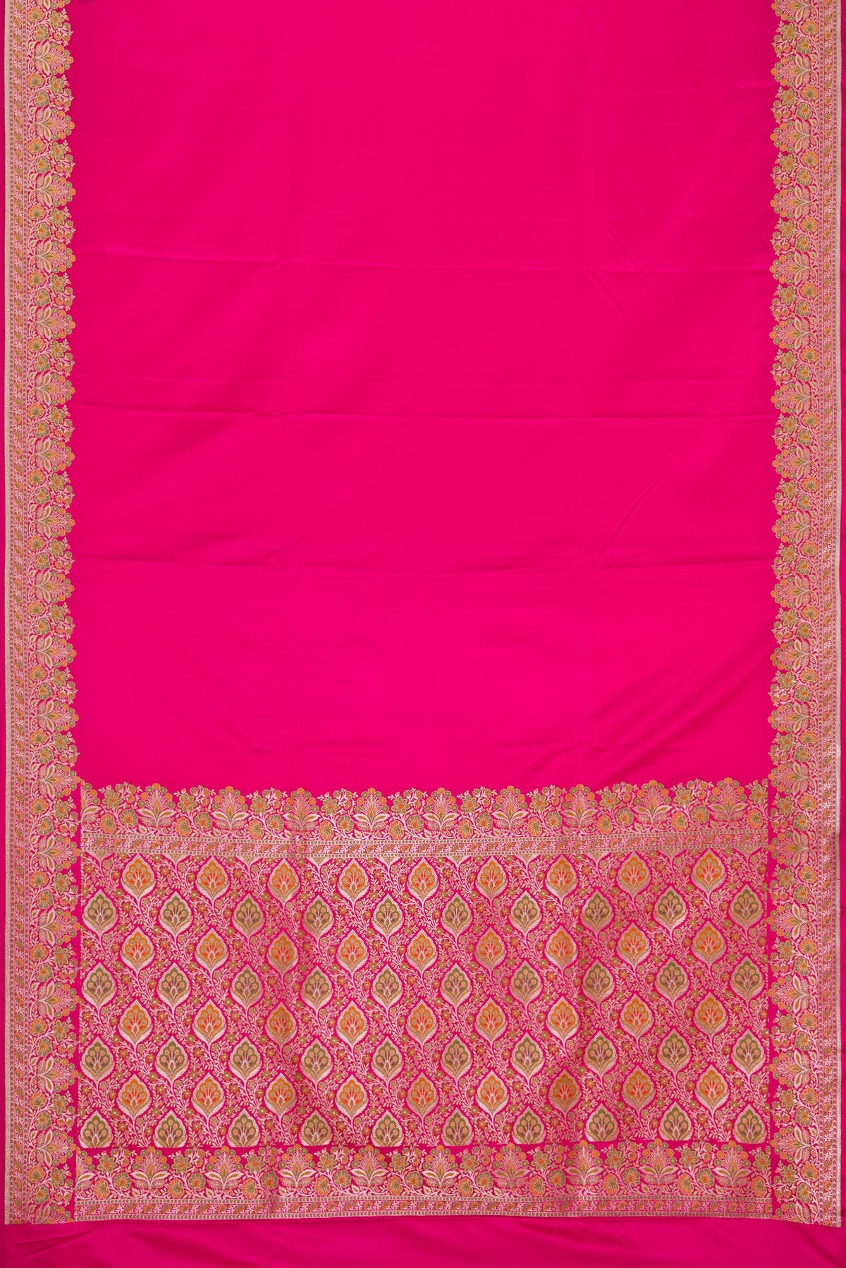 Flat view of Pink Dual Tone Banarasi Silk Saree with Plain Body and Zari Border. 