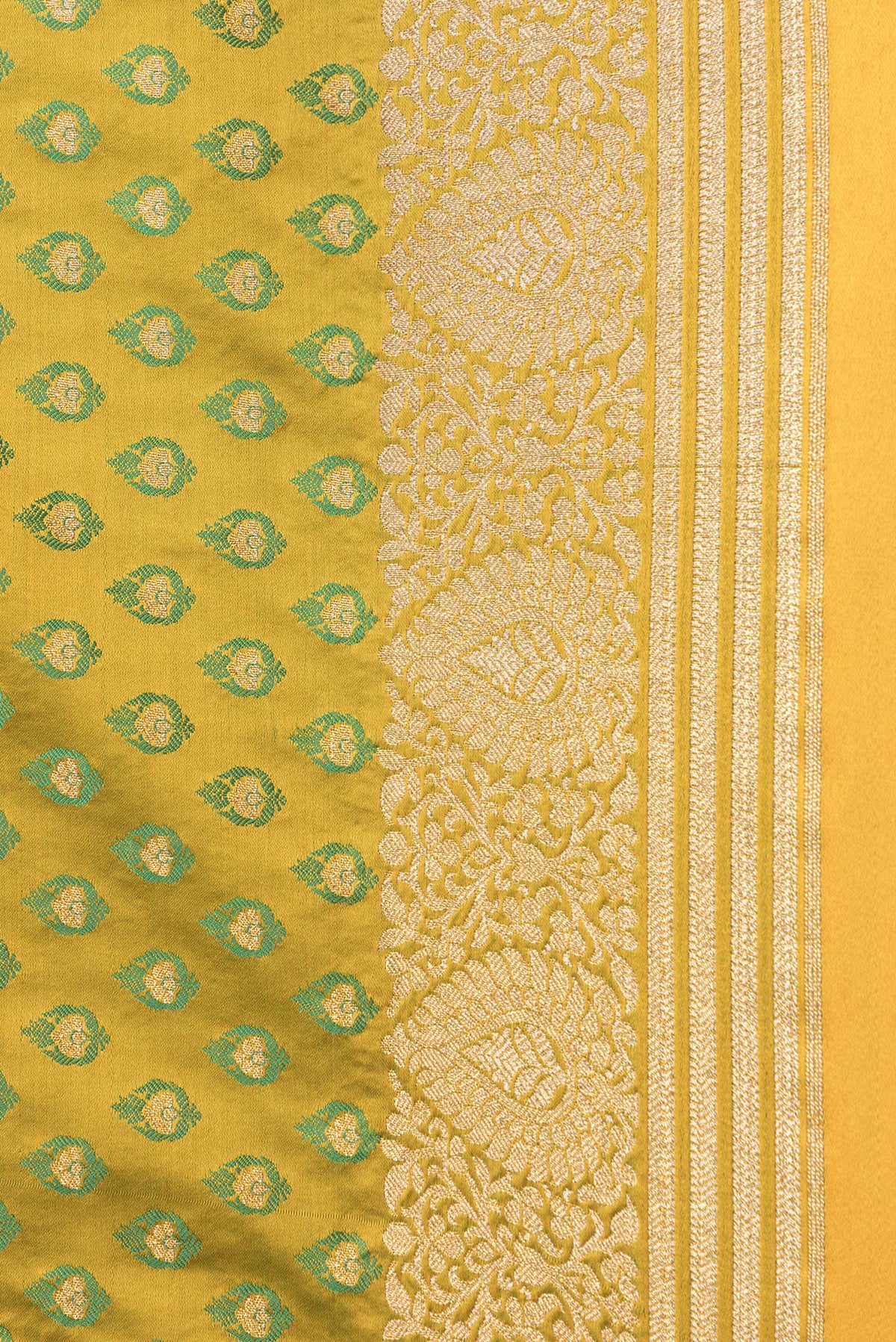 Border image of Mehandi Green Dual Tone Blended Banarasi Silk Saree with Zari And Thread Butta on the body and Zari Border. 