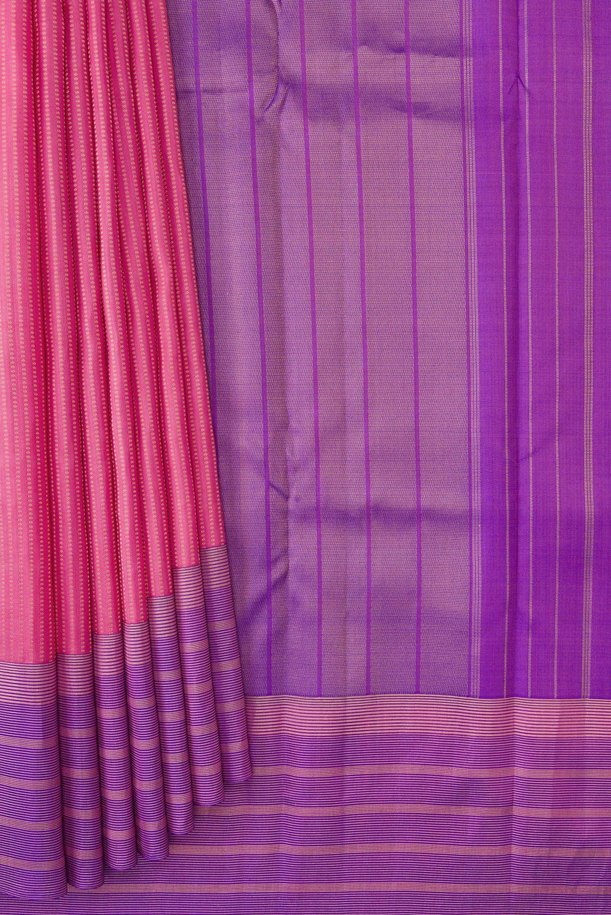 Pleats and pallu of Pink Dual Tone Kanchipuram Silk Saree with Stripes on the body and Zari Border. 