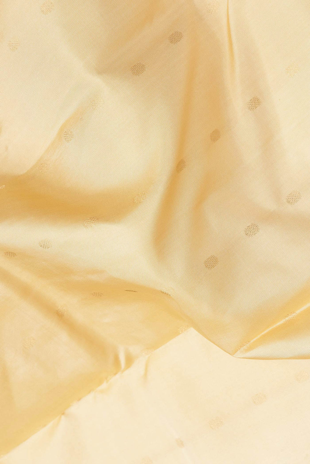 Close up of Sandal Dual Tone Kanchipuram Silk Saree with Zari Butta on the body and Zari Border.  displaying folds