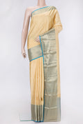 Sandal Dual Tone Kanchipuram Silk Saree with Zari Butta on the body and Zari Border.  displayed on a mannequin