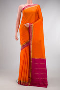 Orange Dual Tone Mysore Silk Saree with Plain Body and Zari Border.  displayed on a mannequin