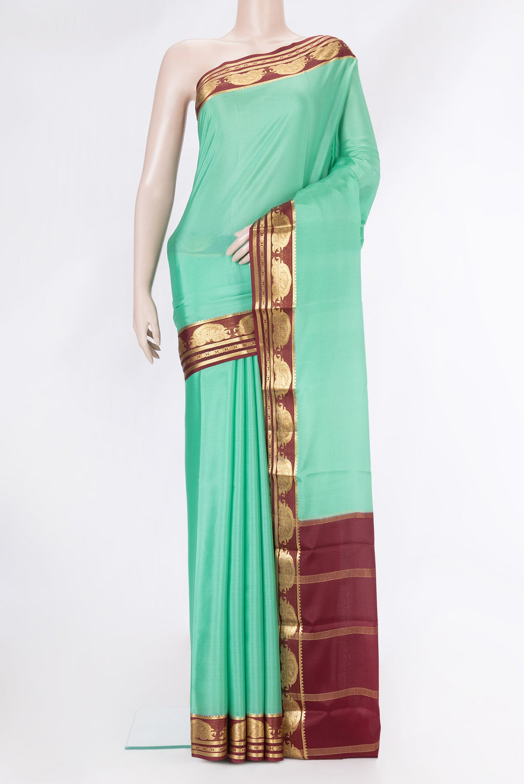 Light Green Dual Tone Mysore Silk Saree with Plain Body and Zari Border.  displayed on a mannequin