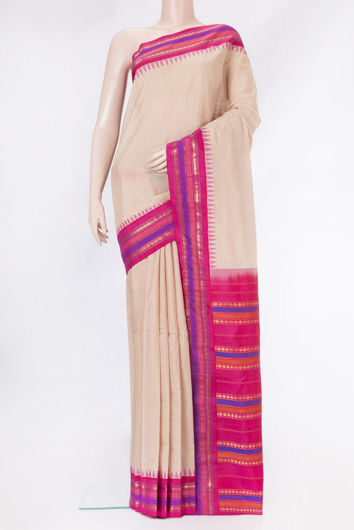 Beige Dual Tone Gadwal Silk Saree with Checked design on the body and Zari Border.  displayed on a mannequin