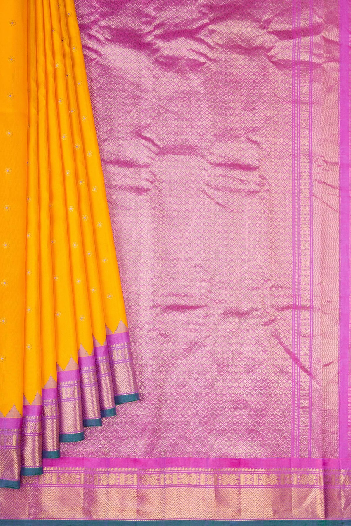 Pleats and pallu of Mustard Dual Tone Gadwal Silk Saree with Zari Butta on the body and Zari Border. 