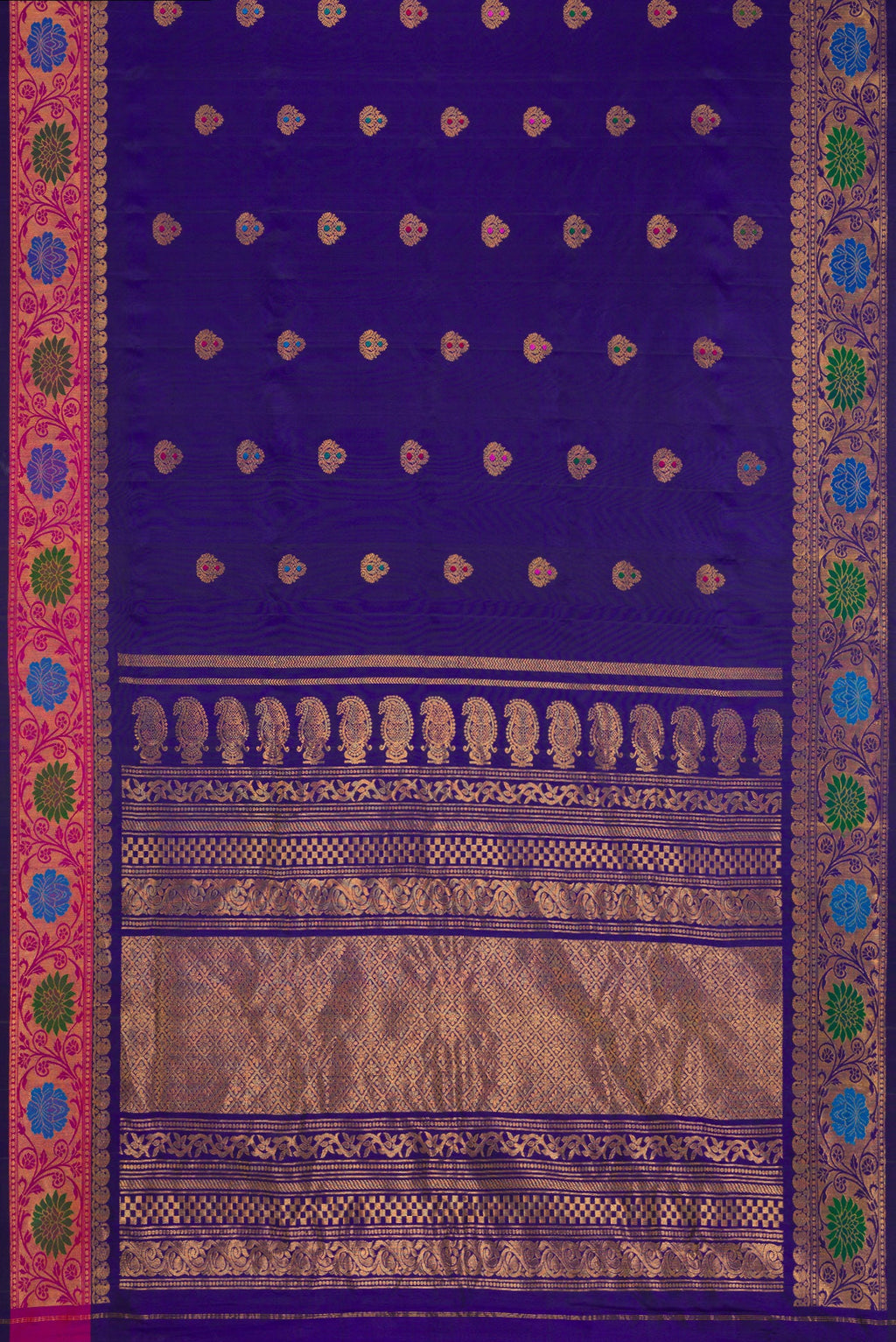 Flat view of Royal Blue Dual Tone Gadwal Silk Saree with Zari And Thread Butta on the body and Zari Border. 