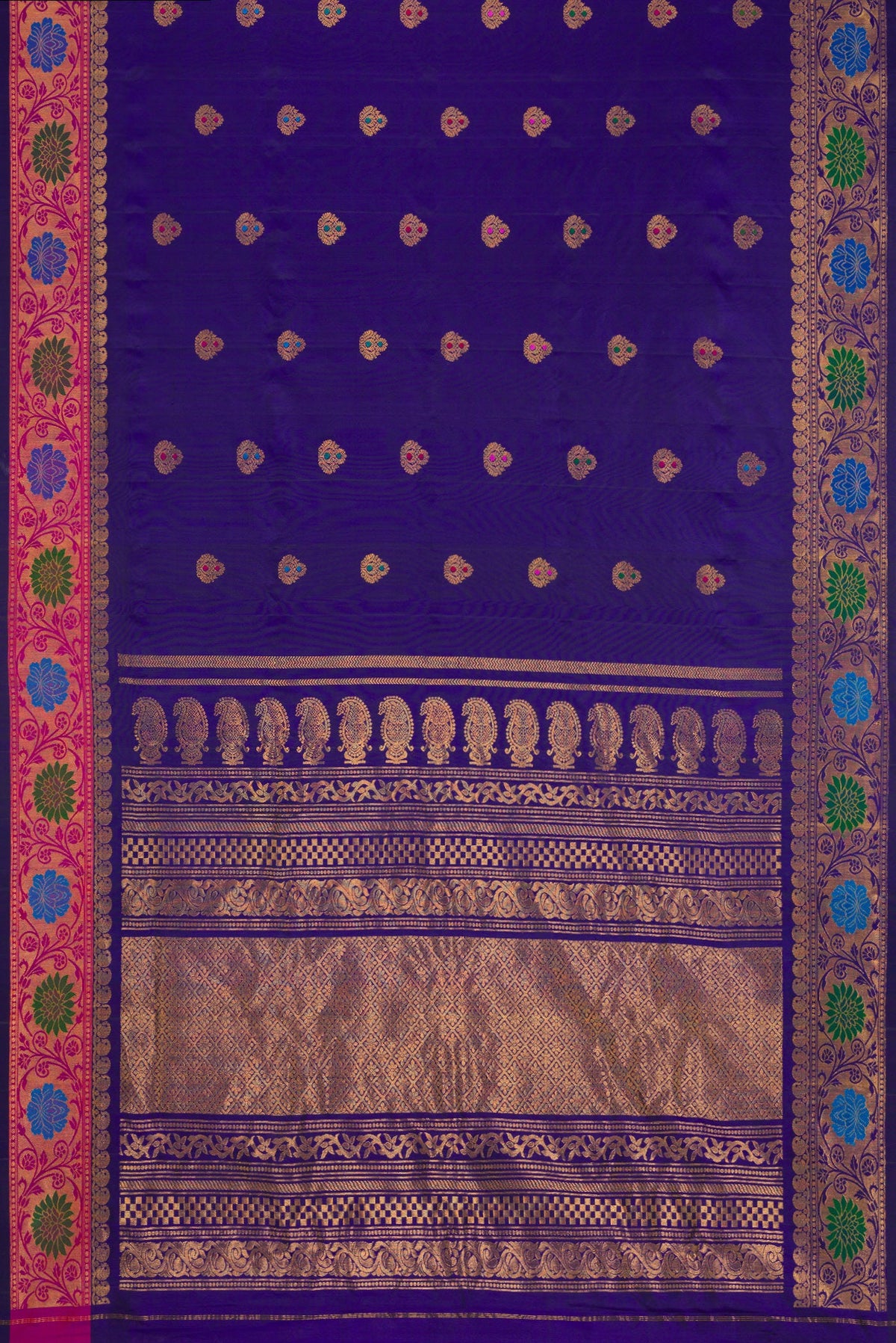 Flat view of Royal Blue Dual Tone Gadwal Silk Saree with Zari And Thread Butta on the body and Zari Border. 