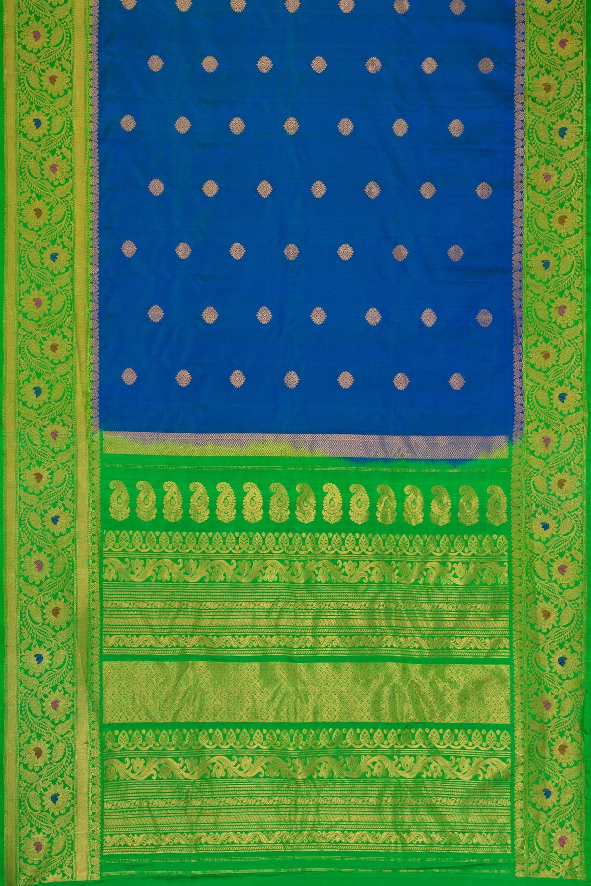 Flat view of Peacock Blue Dual Tone Gadwal Silk Saree with Zari Butta on the body and Zari Border. 
