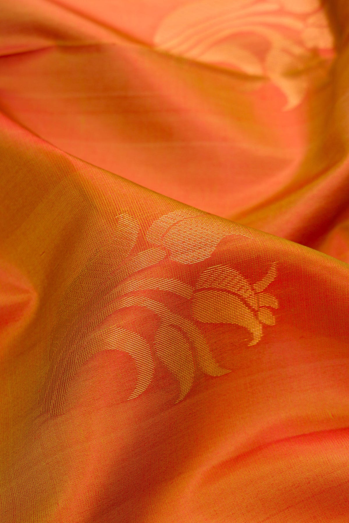 Close up of Multi Color Soft Silk Saree with Zari Butta on the body and Zari Border.  displaying folds