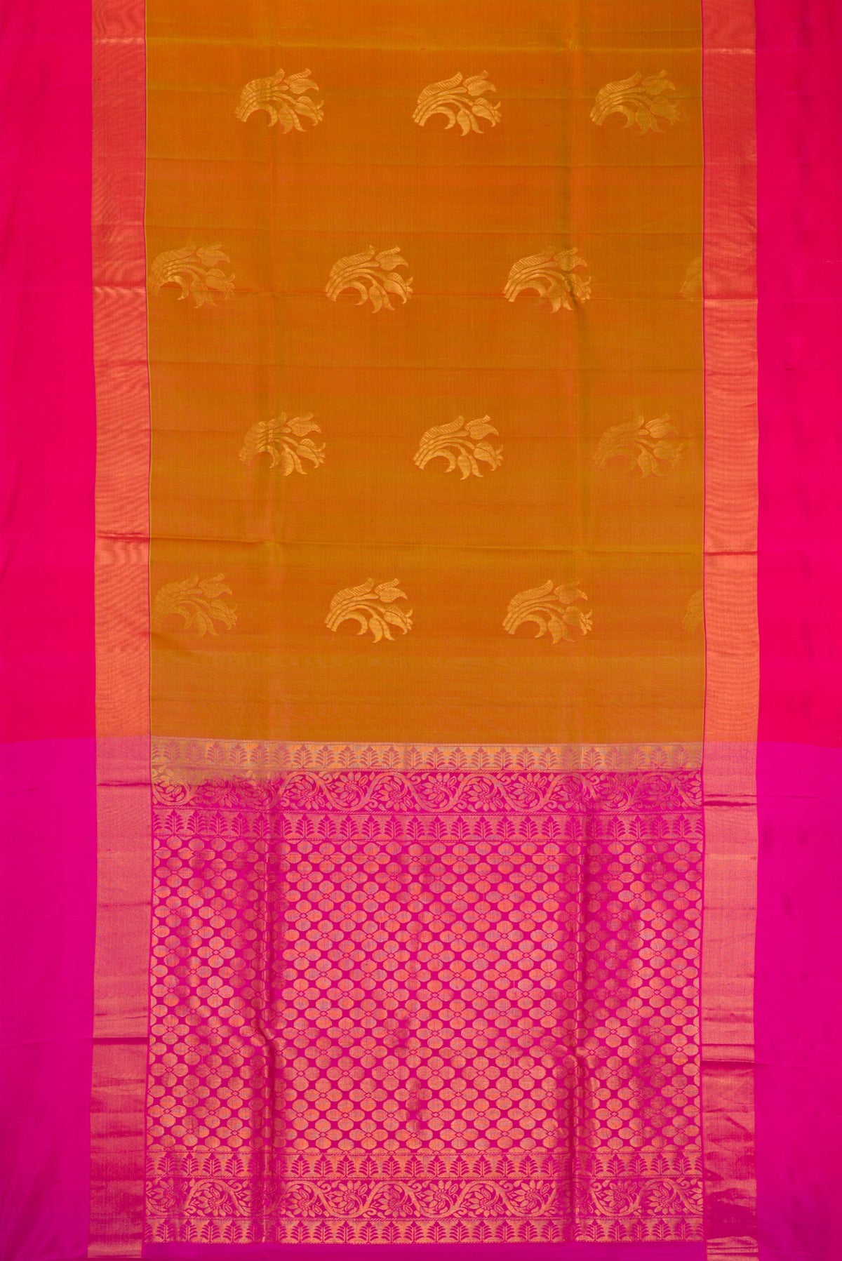 Flat view of Multi Color Soft Silk Saree with Zari Butta on the body and Zari Border. 