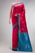 Dark Pink Soft Silk Saree with Zari Butta on the body and Fancy Border.  displayed on a mannequin