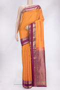Orange Dual Tone Kanchipuram Silk Saree with Checked design on the body and Zari Border.  displayed on a mannequin