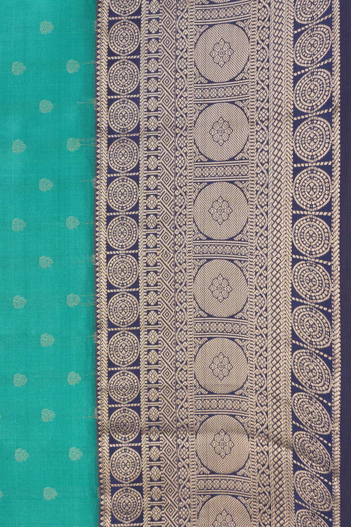 Border image of Sea Green Dual Tone Kanchipuram Silk Saree with Zari Butta on the body and Zari Border. 