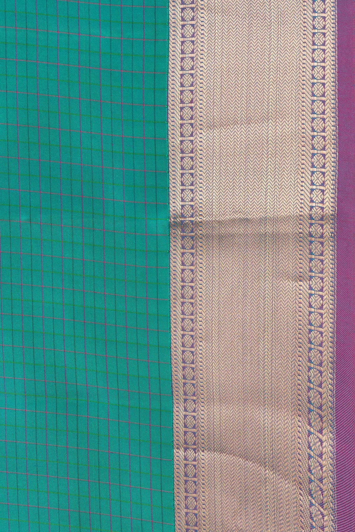 Border image of Green Dual Tone Kanchipuram Silk Saree with Checked design on the body and Zari Border. 