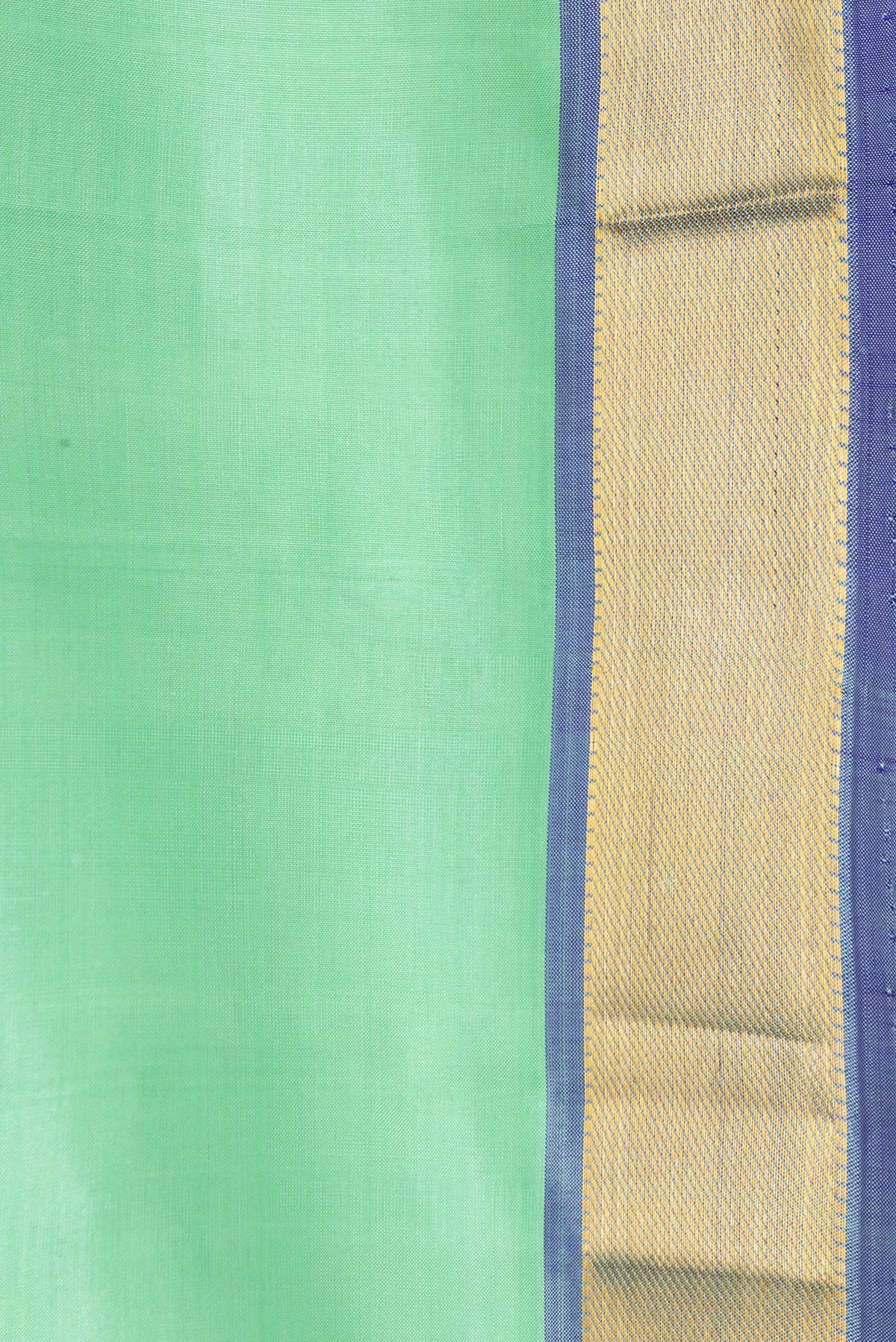 Border image of Sea Green Dual Tone Kanjivaram Silk Saree with Plain Body and Zari Border. 