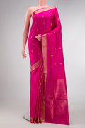 Pink Soft Silk Saree with Zari Butta on the body and Zari Border.  displayed on a mannequin