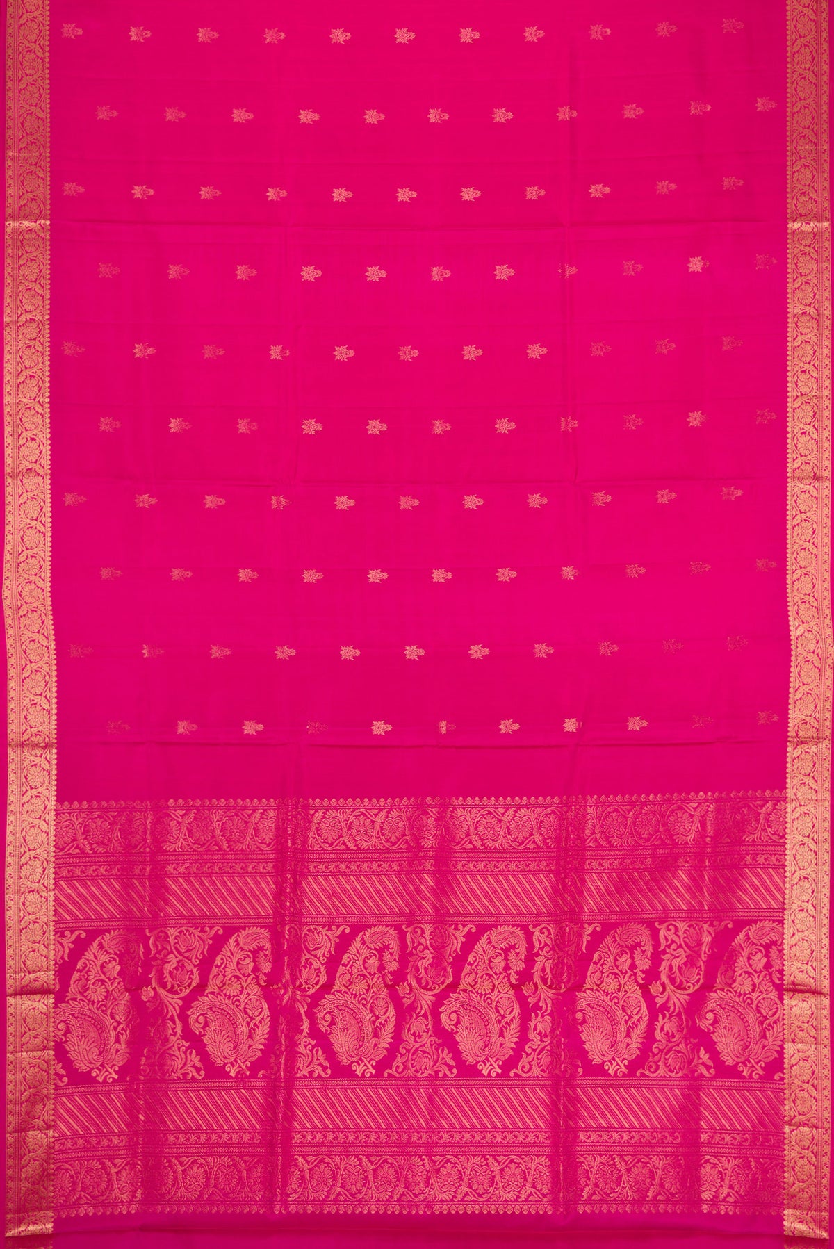 Flat view of Pink Soft Silk Saree with Zari Butta on the body and Zari Border. 