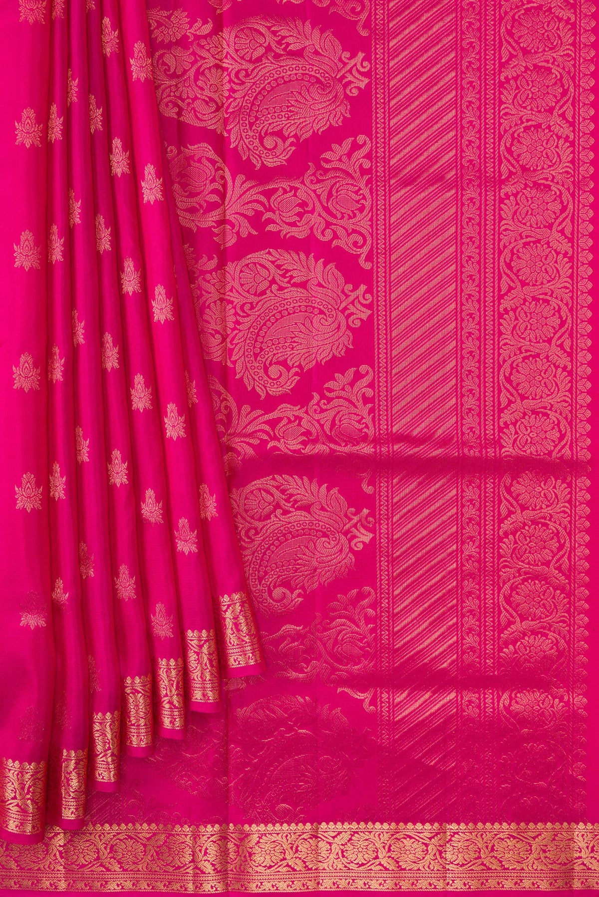 Pleats and pallu of Pink Soft Silk Saree with Zari Butta on the body and Zari Border. 