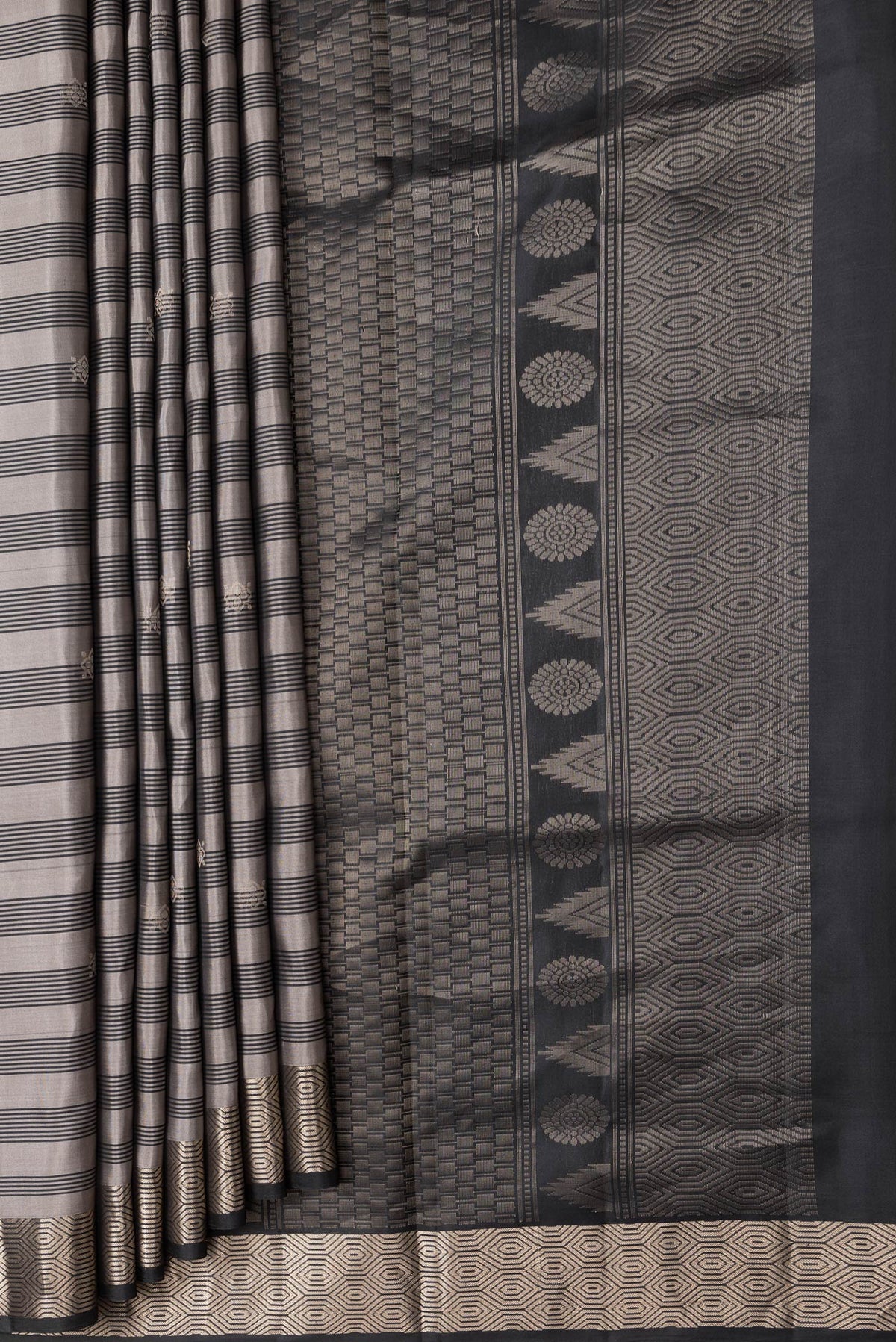 Pleats and pallu of Grey Dual Tone Soft Silk Saree with Stripes on the body and Zari Border. 