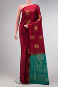 Maroon Dual Tone Soft Silk Saree with Zari Butta on the body and Without Border.  displayed on a mannequin