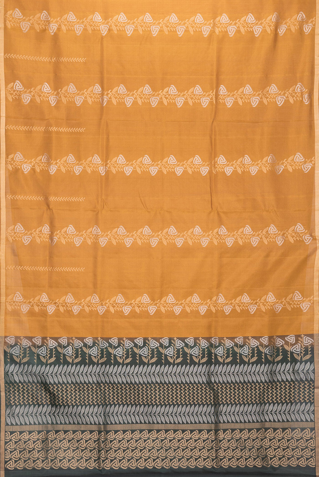 Flat view of Mustard Dual Tone Soft Silk Saree with Zari Butta on the body and Zari Border. 