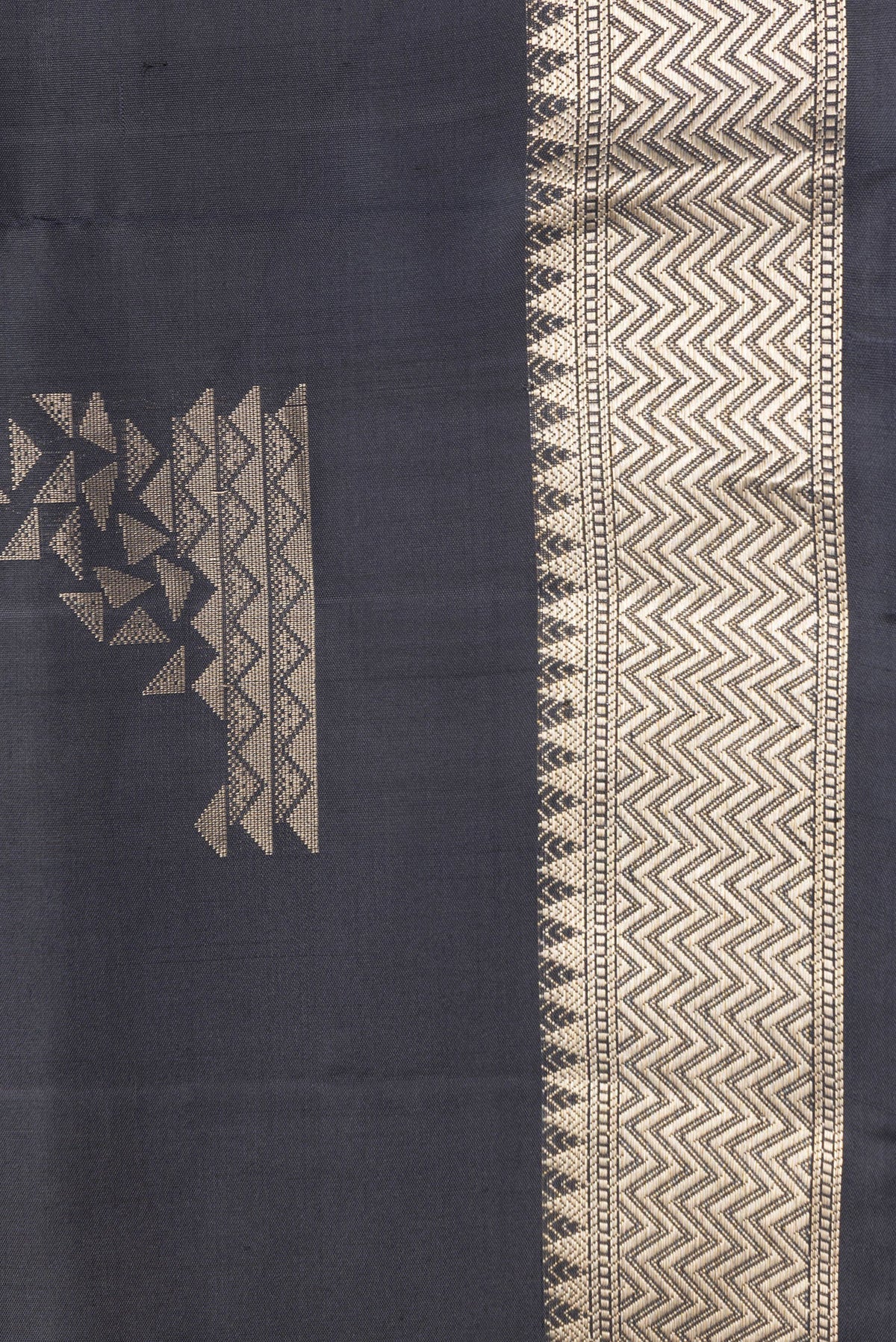 Border image of Black Dual Tone Soft Silk Saree with Zari Butta on the body and Zari Border. 