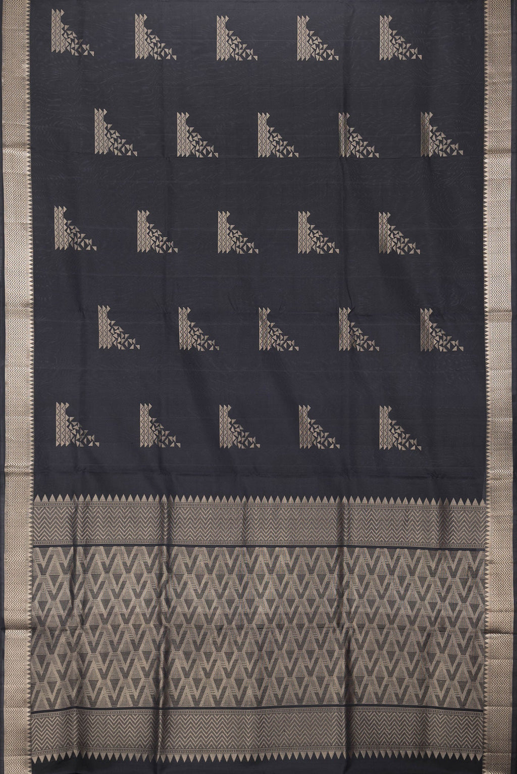 Flat view of Black Dual Tone Soft Silk Saree with Zari Butta on the body and Zari Border. 