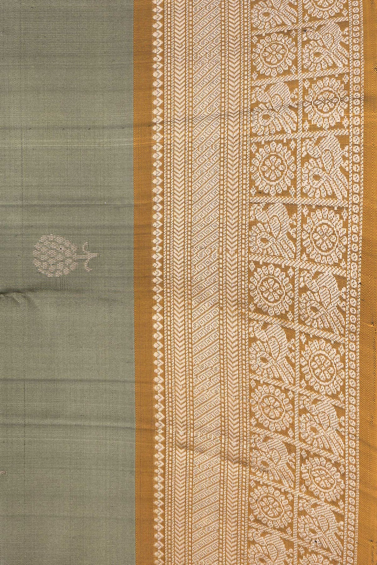 Border image of Mehandi Green Dual Tone Soft Silk Saree with Zari Butta on the body and Zari Border. 
