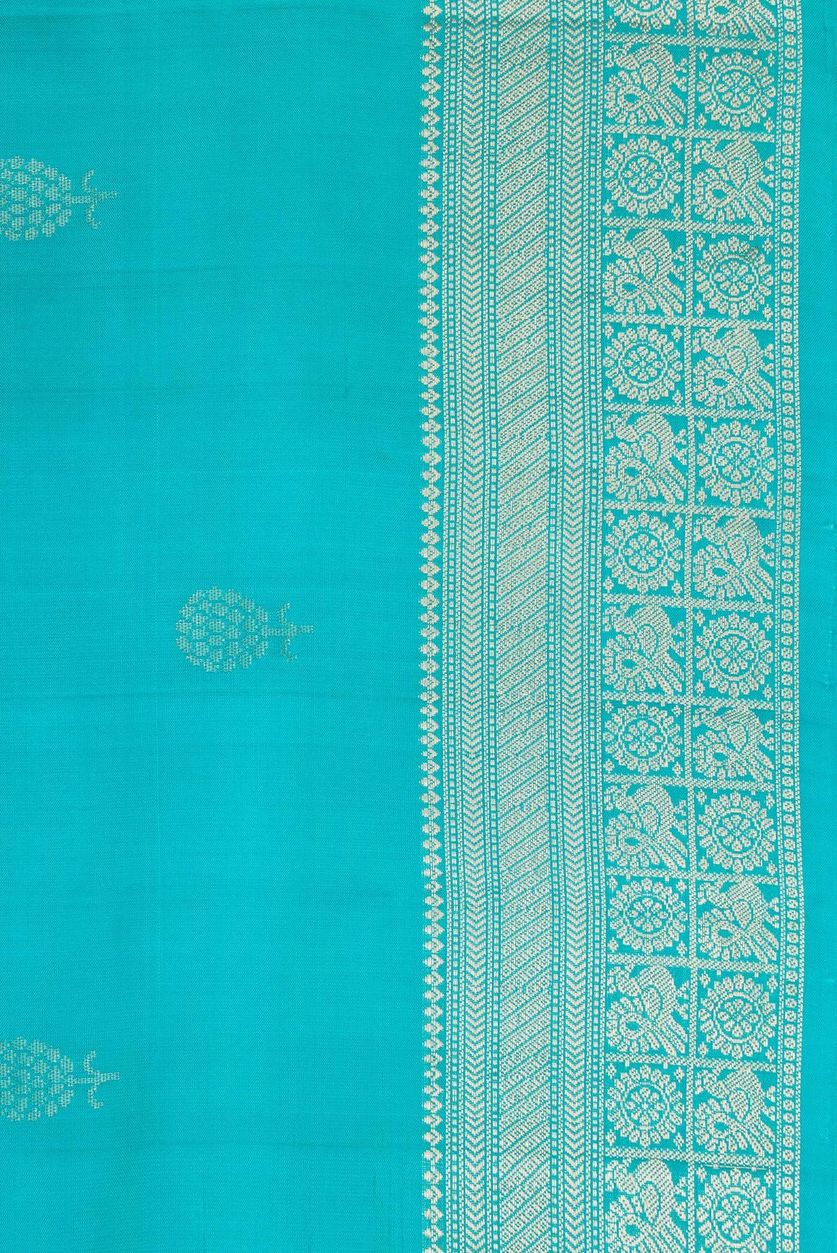 Border image of Maya Blue Dual Tone Soft Silk Saree with Zari Butta on the body and Zari Border. 
