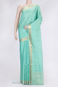 Sea Green Dual Tone Soft Silk Saree with Zari Butta on the body and Zari Border.  displayed on a mannequin