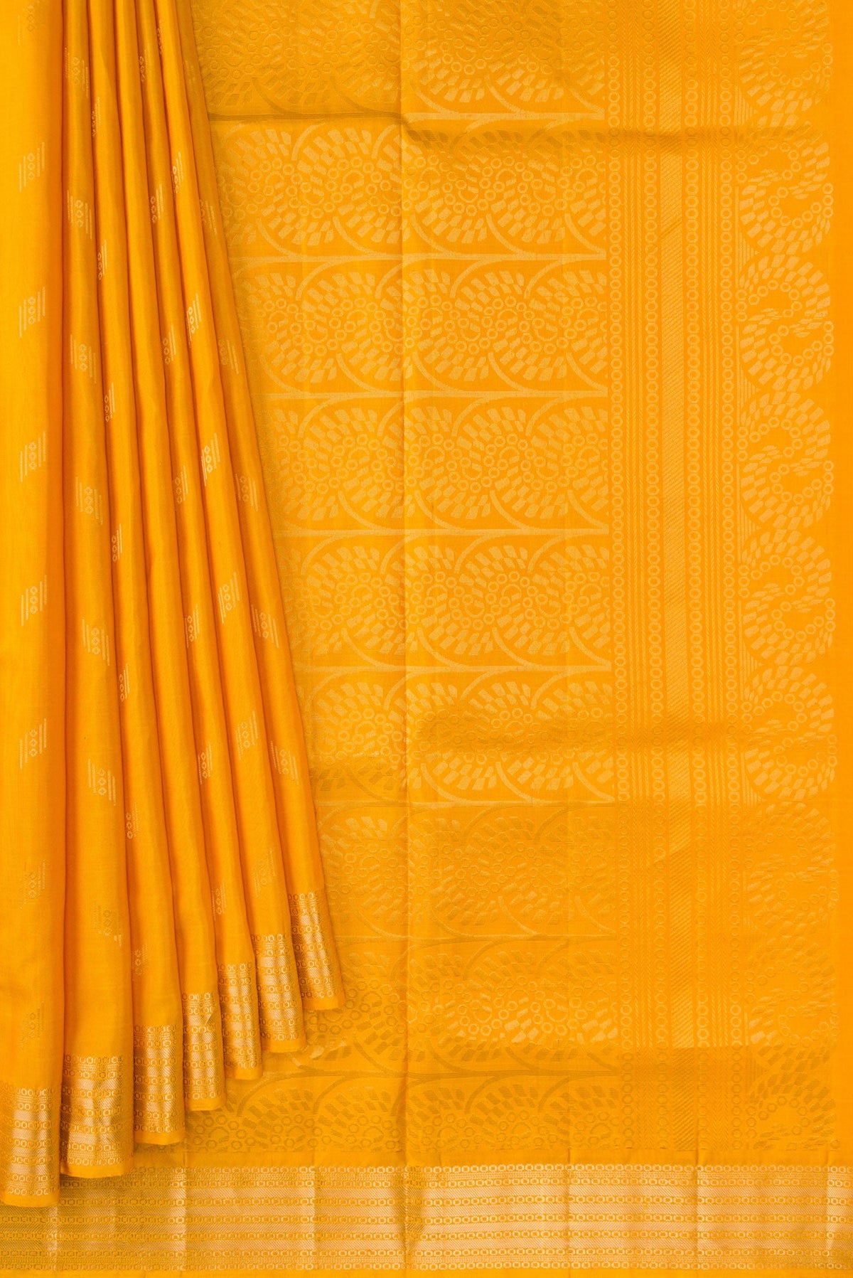 Pleats and pallu of Mustard Dual Tone Soft Silk Saree with Zari Butta on the body and Zari Border. 