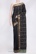 Black Dual Tone Soft Silk Saree with Zari Butta on the body and Zari Border.  displayed on a mannequin