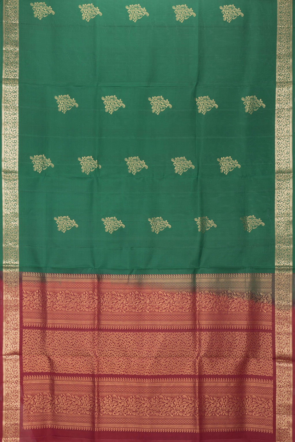 Flat view of Bottle Green Dual Tone Soft Silk Saree with Zari Butta on the body and Zari Border. 