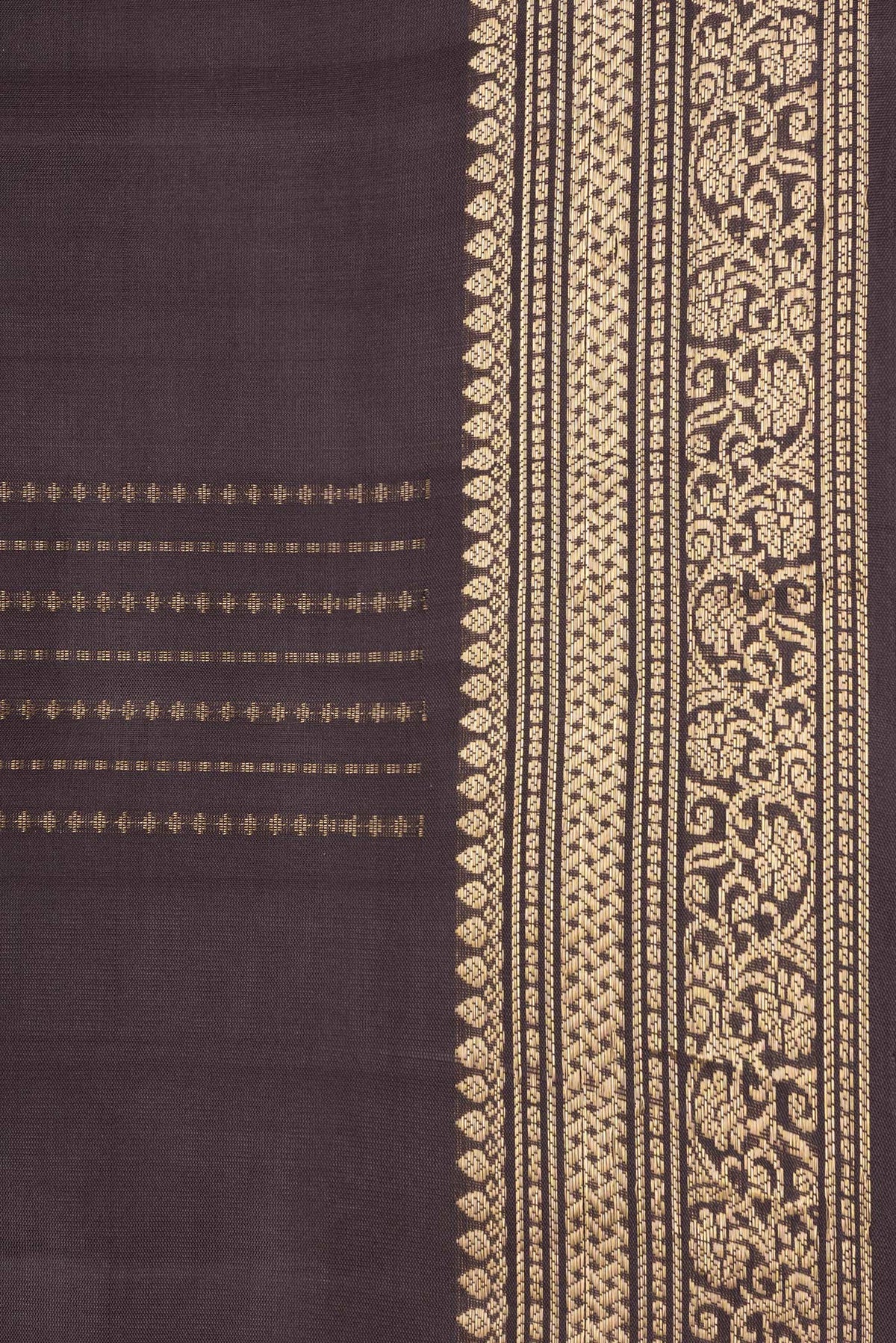 Border image of Brown Dual Tone Soft Silk Saree with Zari Butta on the body and Zari Border. 