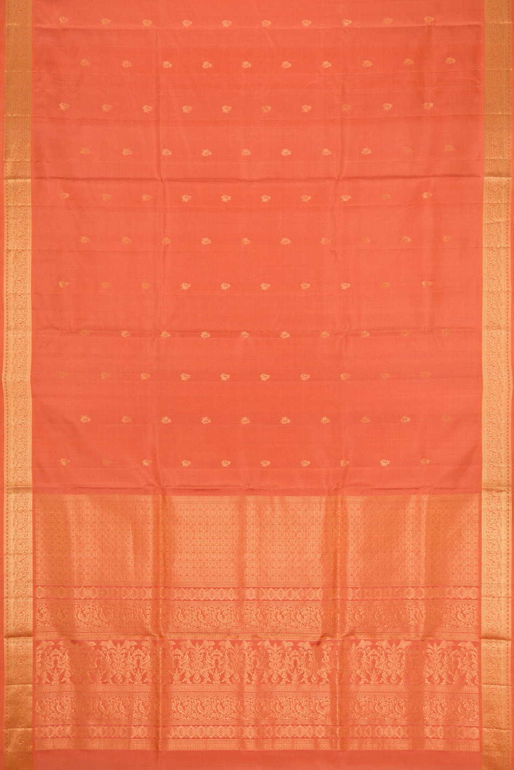 Flat view of Peach Soft Silk Saree with Zari Butta on the body and Zari Border. 
