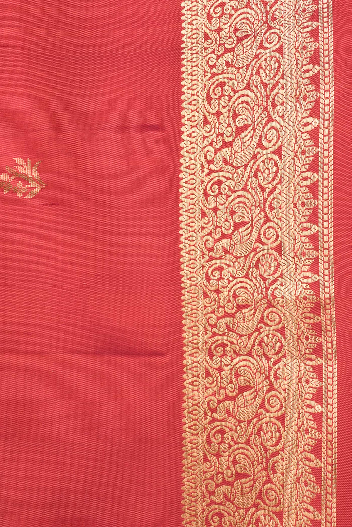 Border image of Brick Orange Dual Tone Soft Silk Saree with Zari Butta on the body and Zari Border. 