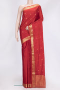 Brick Orange Dual Tone Soft Silk Saree with Zari Butta on the body and Zari Border.  displayed on a mannequin