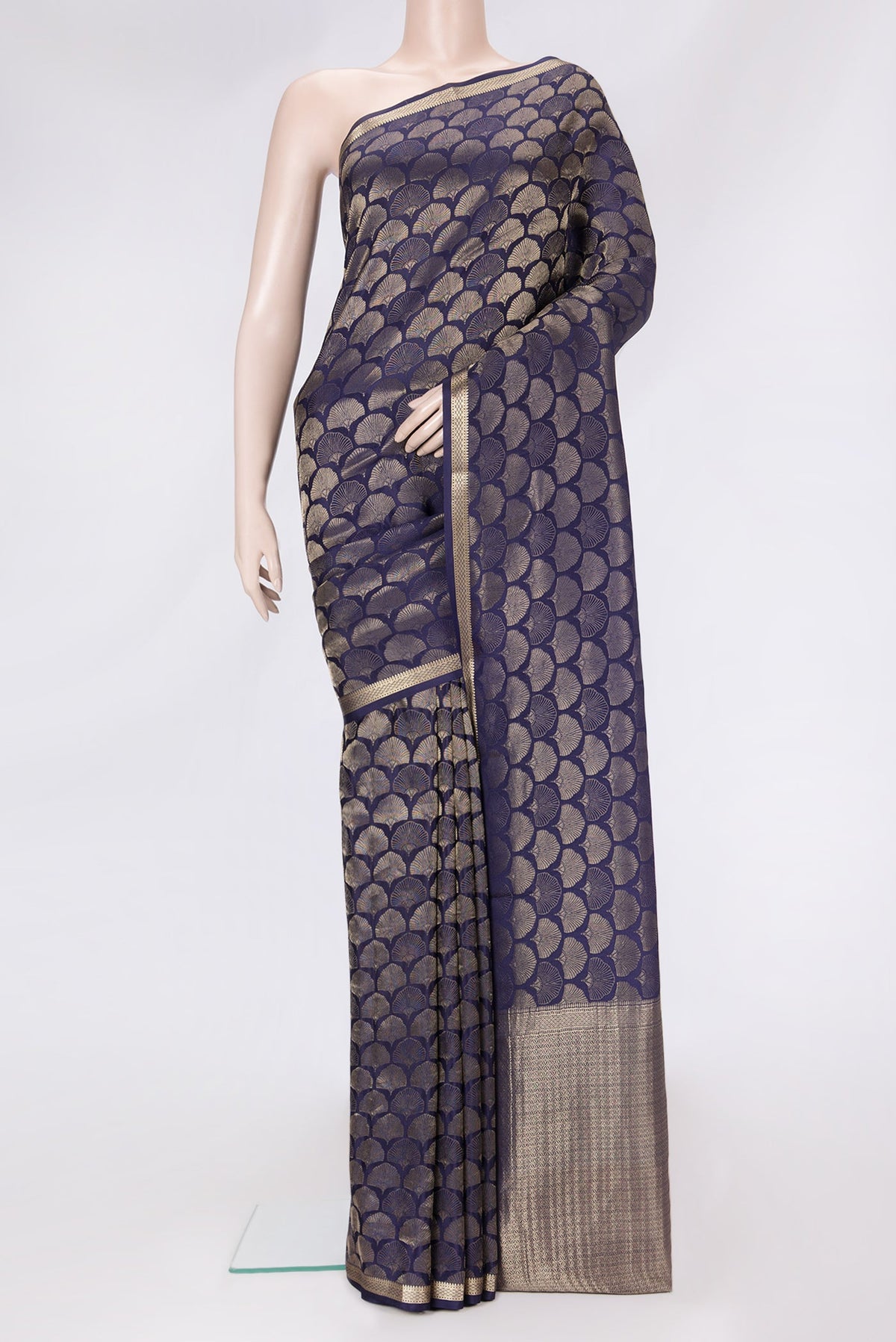 Navy Blue Dual Tone Tussar Silk Saree with Zari Brocade on the body and Zari Border.  displayed on a mannequin
