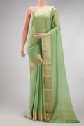 Pista Green Mysore Chiffon Saree with Plain Body and Zari Border.  displayed on a mannequin