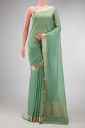 Light Green Dual Tone Georgette Saree with Plain Body and Zari Border.  displayed on a mannequin