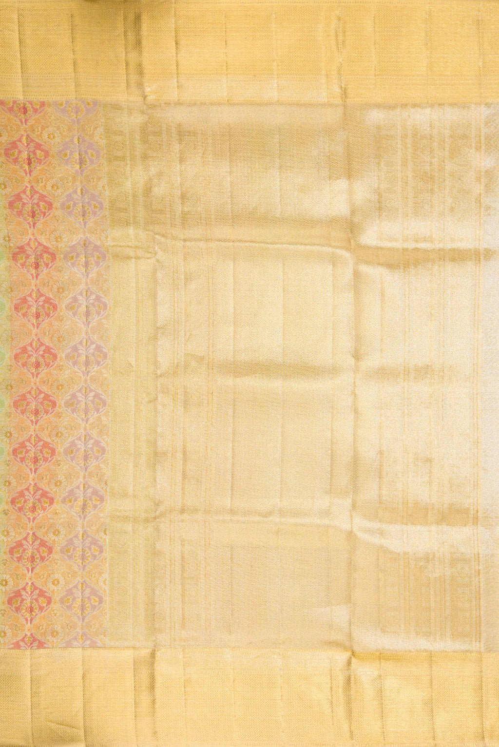 Close up image of the pallu of Gold Dual Tone Kanjivaram Tissue Silk Saree with Zari Brocade on the body and Zari Border. 