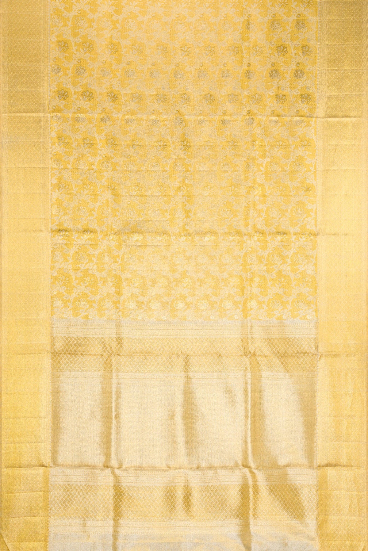 Flat view of Gold Dual Tone Kanjivaram Tissue Silk Saree with Zari Brocade on the body and Zari Border. 