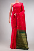 Red Dual Tone Kanchipuram Silk Saree with Zari Butta on the body and Without Border.  displayed on a mannequin