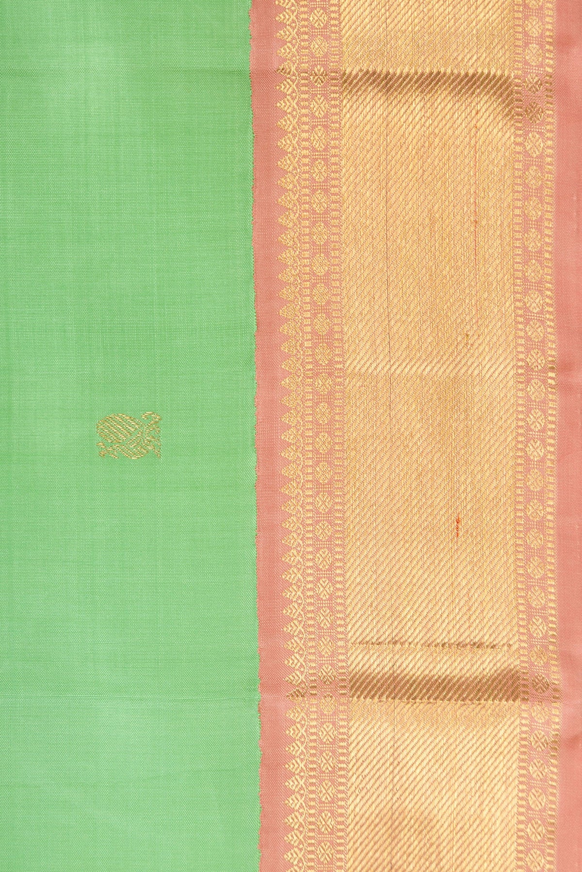 Border image of Light Green Dual Tone Kanjivaram Silk Saree with Zari Butta on the body and Zari Border. 