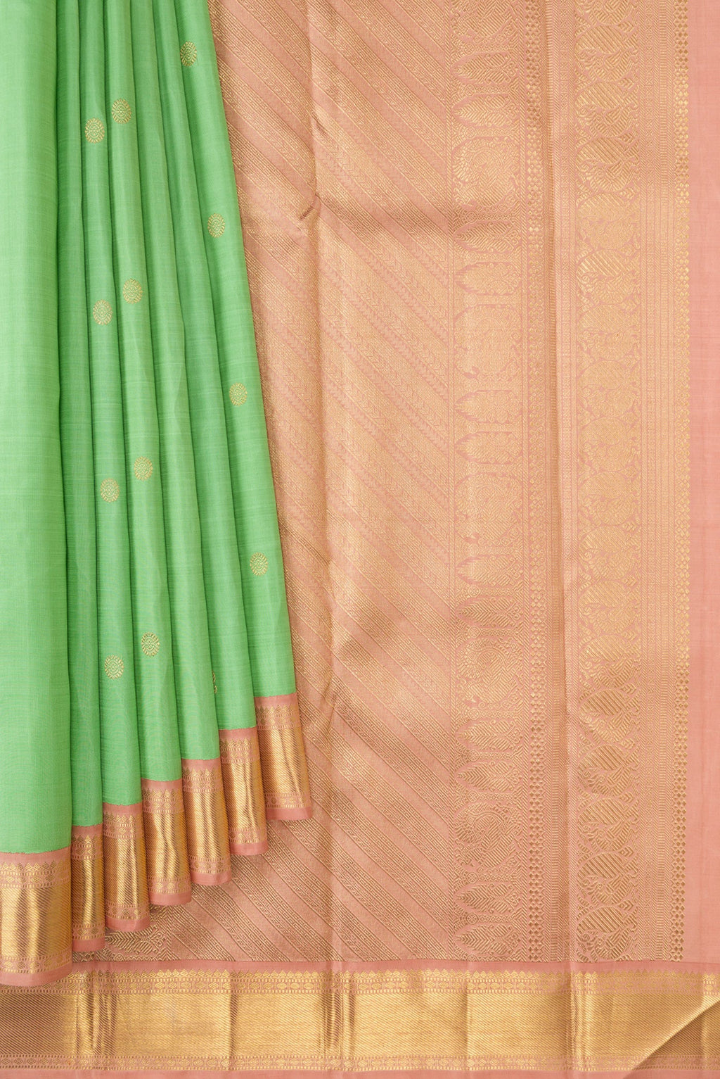 Pleats and pallu of Light Green Dual Tone Kanjivaram Silk Saree with Zari Butta on the body and Zari Border. 