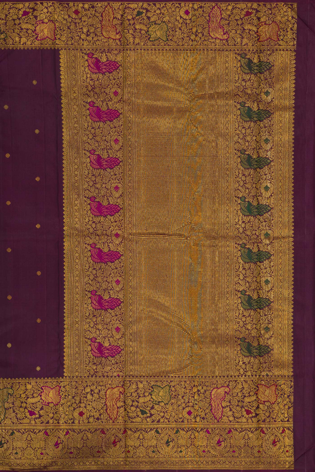 Close up image of the pallu of Purple Kanchipuram Silk Saree with Zari Butta on the body and Fancy Border. 